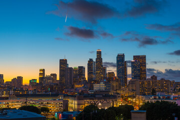 Fototapeta na wymiar Downtown Los Angeles At Sunset DTLA WITH GENUINE FALLING STAR