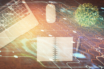 Double exposure of data theme drawing hologram over topview work table background with computer. Concept of technology.