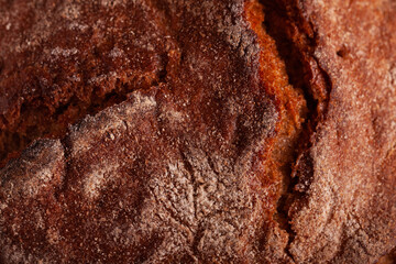 Fresh crusty handcraft bread close up.