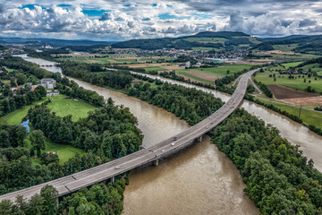 highway over two rivers with flood in switzerland 