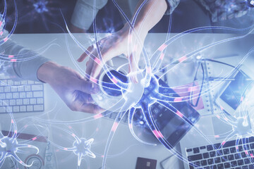 Double exposure of man and woman working together and neuron hologram drawing. Computer background. Top View. Education concept.