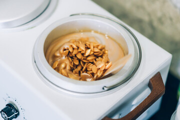 Pieces of wax for depilation in the wax heating machine