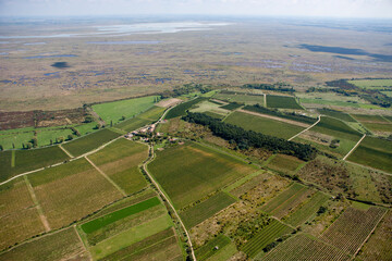 Naklejka premium Aerial panoramic drone view of a beautiful Hungarian landscape on a moody summer morning.