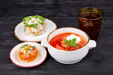 borsch with sour cream, bun with garlic, lettuce, olivier, compote