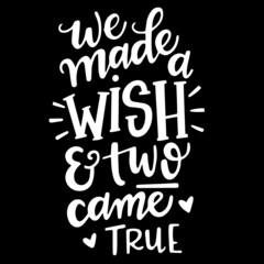 we made a wish and two came true on black background inspirational quotes,lettering design