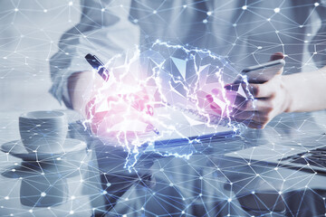 Double exposure of brain sketch hologram and woman holding and using a mobile device.