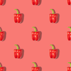Red pepper seamless pattern on a red background. Vegetable pattern for the print. Abstract food background.