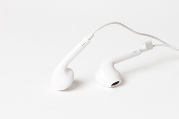 White headphones with a wire