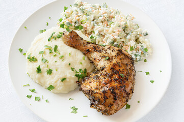 chicken leg with potato and salad