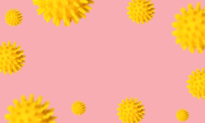 Allergy concept. Frame with yellow air pollen grains on a pink background. Flower pollen abstract...