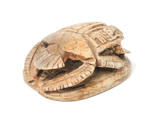 Scarab beetle stone figurine isolated on white background