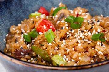 rice, carrots, onions, Bulgarian hot pepper, ginger, cilantro, chili sauce, soy sauce, sesame oil