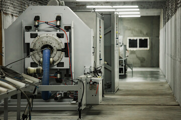 factory machines on a conveyor belt. automated production. engineering communications at the enterprise. sophisticated computerized devices for the production of parts