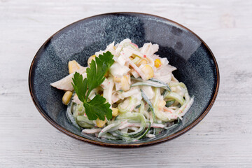 crab salad, with cucumber and greens