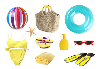 Set with different beach accessories on white background