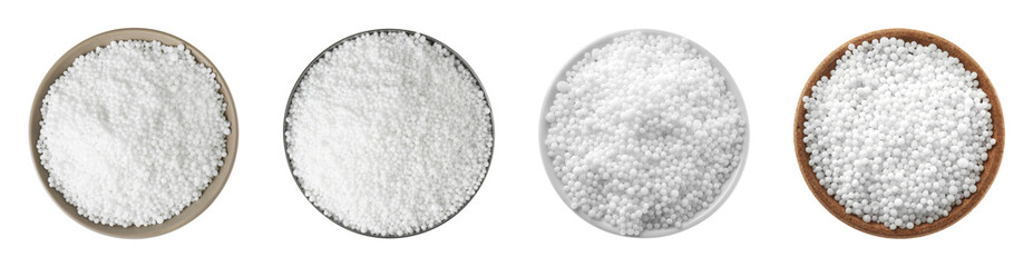 Set with ammonium nitrate pellets in bowls on white background, top view. Mineral fertilizer