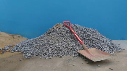 Shovel placed used for scoop stone and sand in construction work,Stone and sand material for...