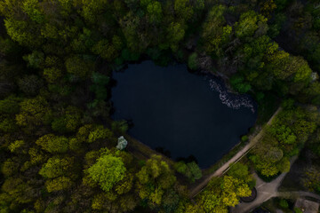 Areal view on lake in the forest