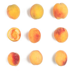 Several ripe peaches on a white background. View from above.