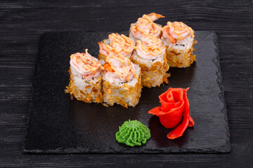 roll, Rice, nori, cream cheese, cucumber, tiger shrimp, tuna chips, salmon, spice sauce