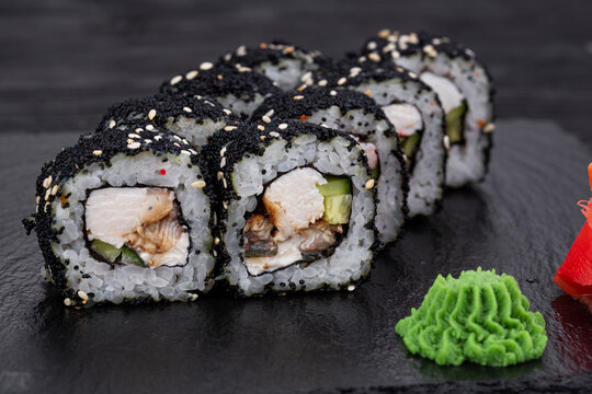 roll, fried salmon, philadelphia, snow crab, cucumber, tobico black, green onion