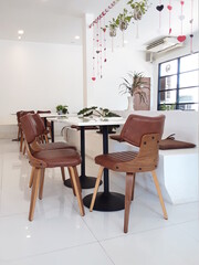 modern cafe interior with chairs and tables