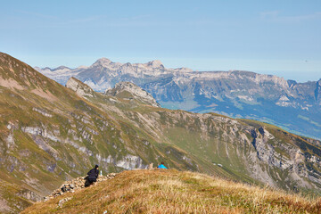 Couple sitting near summit of the Alvier