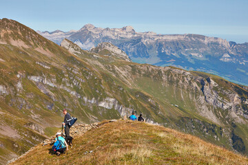 Fototapeta na wymiar Couple sitting near summit of the Alvier