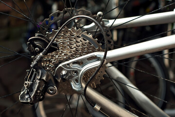 Fototapeta premium Wheel, chain and companion close up. Bicycle spare parts. Bicycle repair.