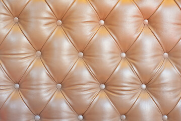 Leather sofa close up. Sofa texture with buttons.