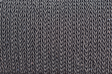 Texture of wicker products. Coarse wool thread closeup.