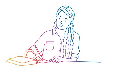 Cute woman with long hair writing a letter or doing homework at the table.