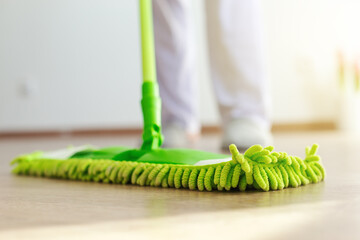 Mopping laminate floor. Household equipment