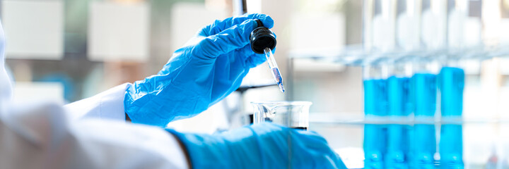Science experiment. Health care researchers working in life science laboratory