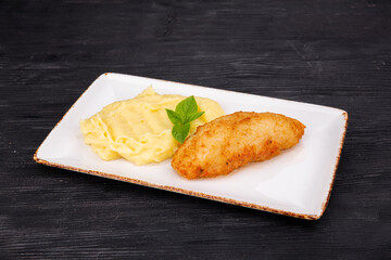 chicken breast, butter, egg, greens, milk, breadcrumbs, potatoes
