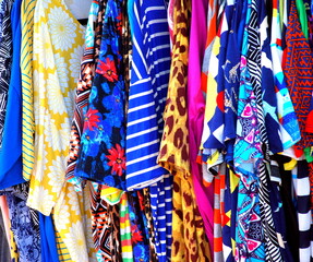 Garage sale items displayed outdoors for sale.