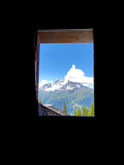 Mountain view in a window frame. Black outline with copy space for text.