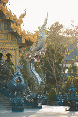 Fototapeta na wymiar Blue Temple Wat Rong Suea Ten in Chiang Rai.