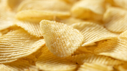 crispy golden potato chips snack texture background
