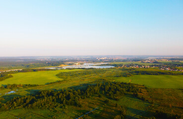 Fototapeta na wymiar Aerial view of green summer landscape with fields