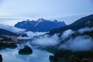 View of lake in Pieve di Cadore after rain with fog