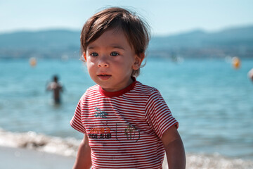 portrait of little boy on the beach