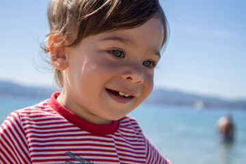 portrait of little boy on the beach