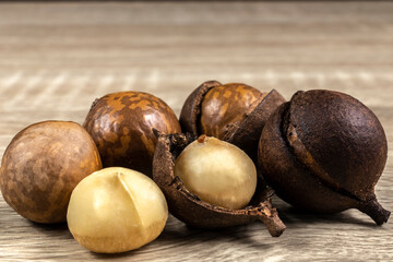 Close-up of macadamia nut with selective focus on the wooden table in Brazil