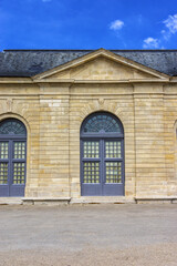 Fototapeta premium Fragment of Orangery building (built in 1686) in beautiful public Parc de Sceaux near old grand country house in Sceaux, Hauts-de-Seine, not far from Paris, France.