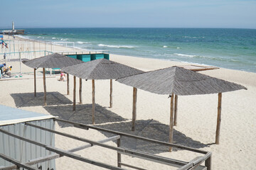Sunshades on the beach, near the sea