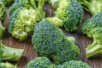  A lot of broccoli for diet and healthy eating. Fresh green broccoli on a   table.Broccoli vegetable is full of vitamin.Vegetables for diet and healthy eating.Organic food.