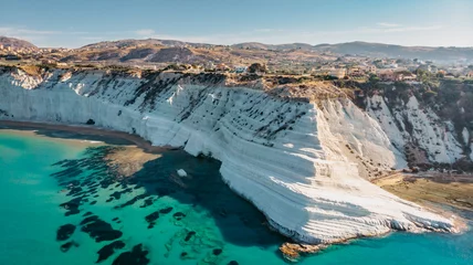 Wall murals Scala dei Turchi, Sicily Scala dei Turchi,Sicily,Italy.Aerial view of white rocky cliffs,turquoise clear water.Sicilian seaside tourism,popular tourist attraction.Limestone rock formation on coast.Travel holiday scenery
