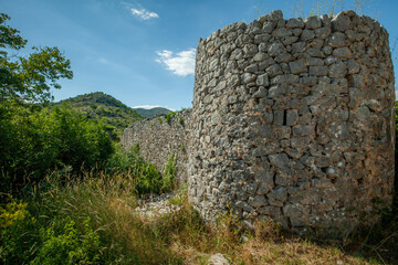The historic site of Hutovo Grad (Hadžibeg's Town) in Hutovo, Neum Municipality, is hereby designated as a National Monument of Bosnia and Herzegovina 
