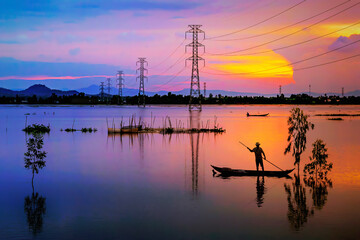 Fototapeta na wymiar Sunset on a flooded field in An Giang, Vietnam.